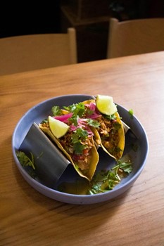 Shredded pork tacos, guacamole and pico de gallo - Image 1